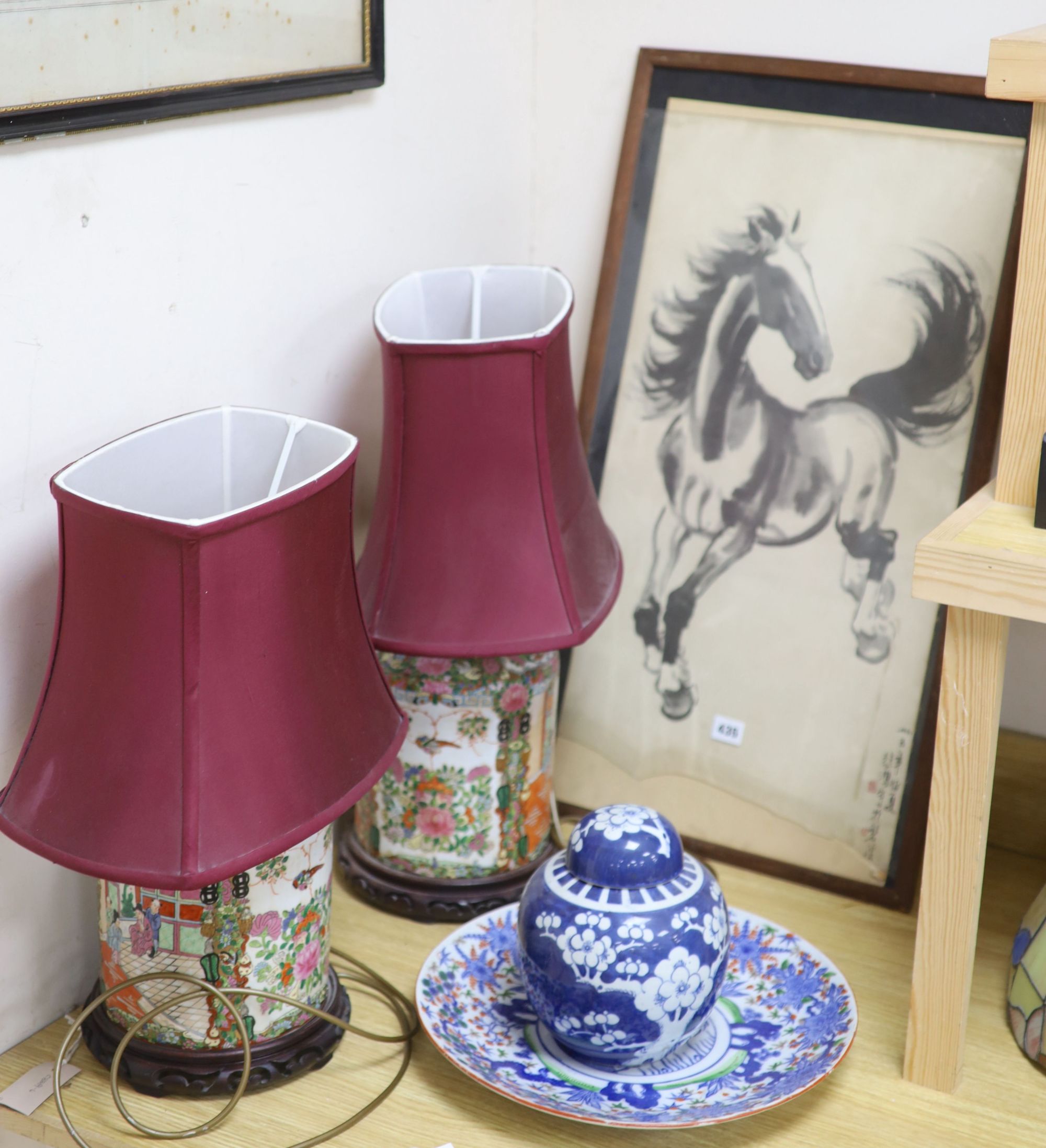 A pair of Chinese famille rose table lamps, 35cm high to lamp fitting, a blue and white jar and cover, a dish and a horse print